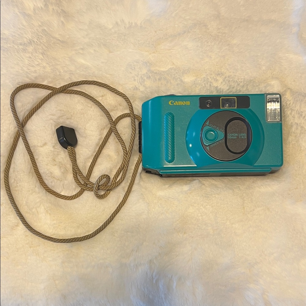 Canon Snappy fully automatic Blue Film Camera with Tan Strap